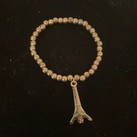 6” golden beaded stackable stretch bracelet with Eiffel Tower pendant & 39 beads - Picture 1 of 11
